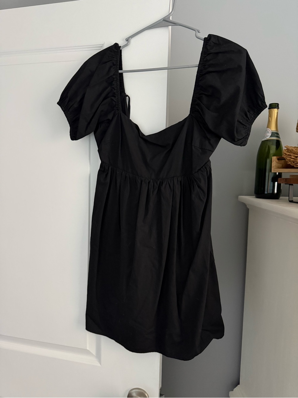 Boutique black mini dress with tie back